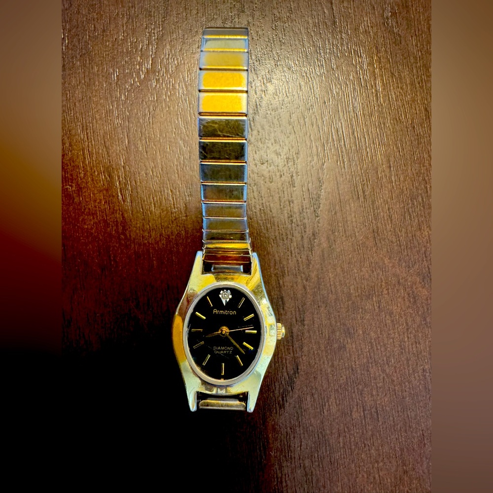 Armitron Gold and Black Diamond Watch
